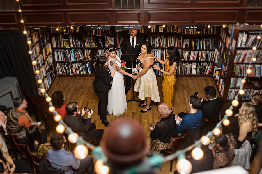 A lesbian wedding ceremony at the housing works bookstore in New York City.
